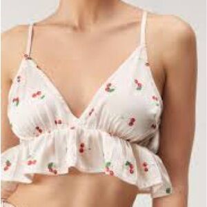 White Sleeveless Top with Red Accents